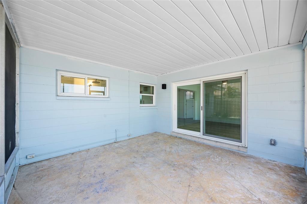 360 145th Avenue Madeira Beach, FL 33708 - Photo 32 of 64 a view of an empty room with window