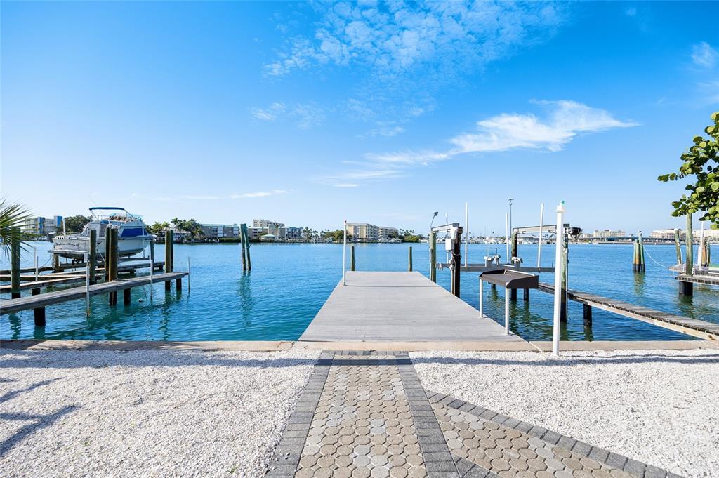 360 145th Avenue Madeira Beach, FL 33708 - Photo 41 of 64 a view of a terrace with chairs