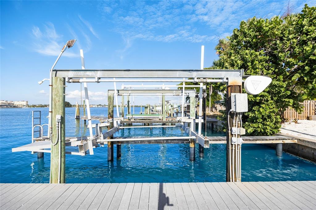 360 145th Avenue Madeira Beach, FL 33708 - Photo 43 of 64 a swimming pool view with a seating space