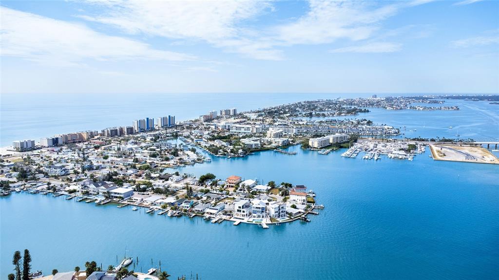 360 145th Avenue Madeira Beach, FL 33708 - Photo 48 of 64 an aerial view of a houses with ocean view