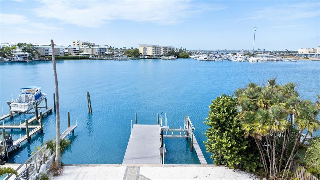 360 145th Avenue Madeira Beach, FL 33708 - Photo 57 of 64 a view of a city and an ocean view