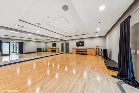 a large white room with large window