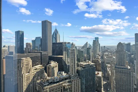a view of a city with tall buildings