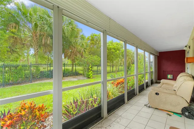 a view of an outdoor space with a large window