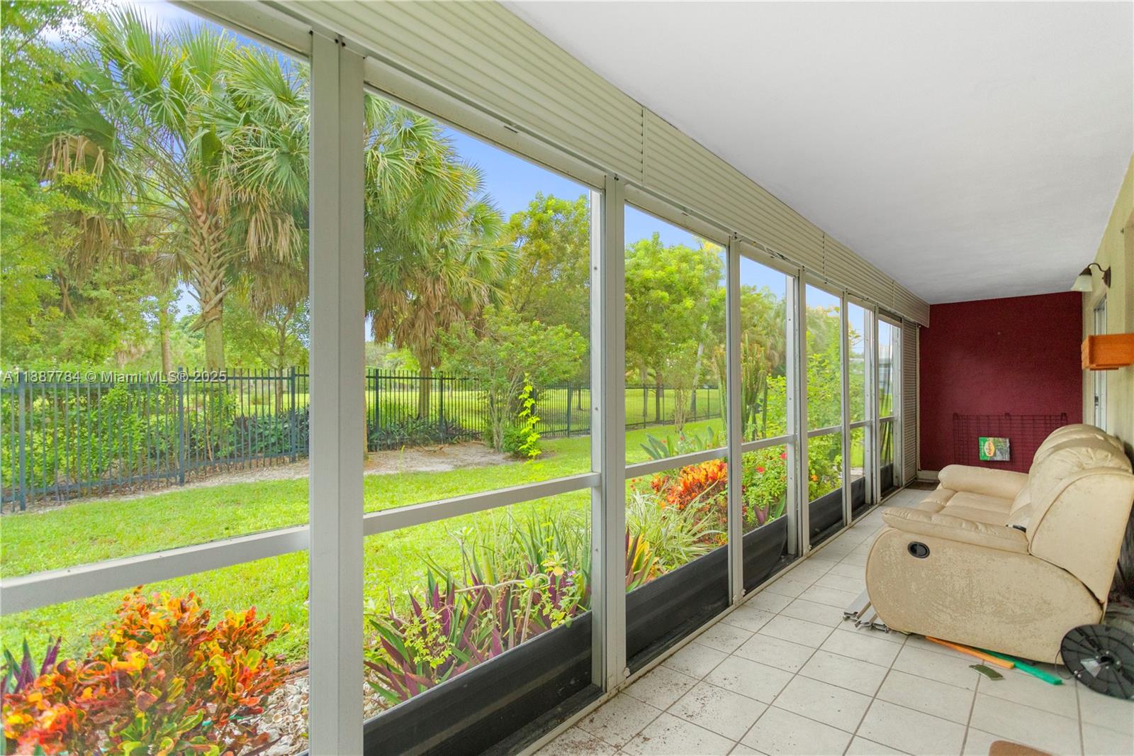 4800 Hillcrest Lane, Unit 101 Hollywood, FL 33021 - Photo 2 of 35 a view of an outdoor space with a large window