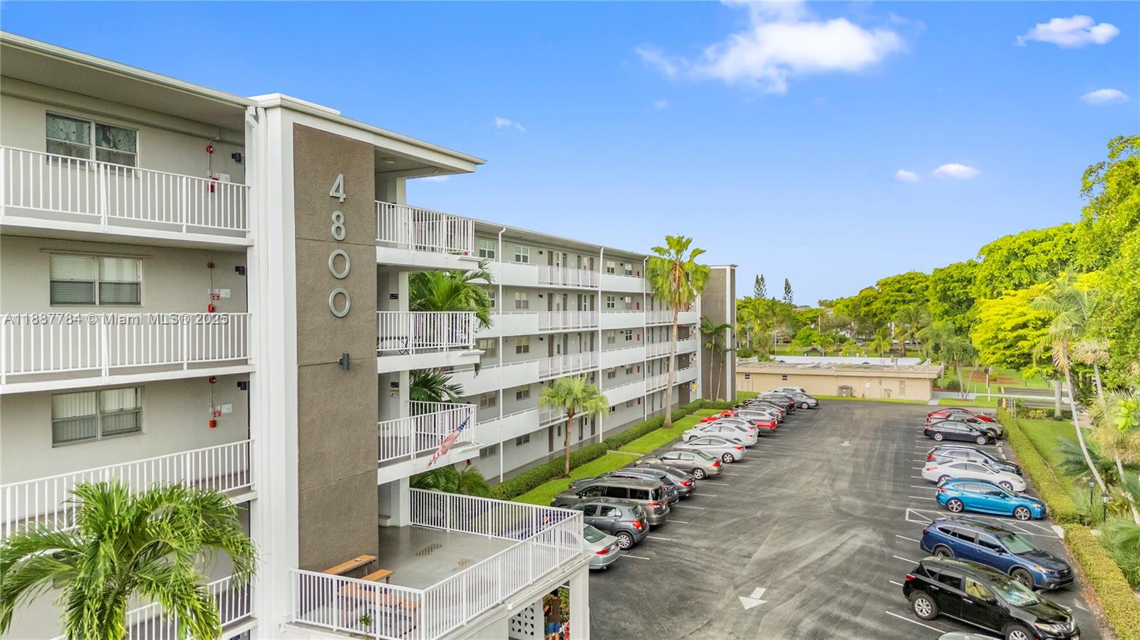 4800 Hillcrest Lane, Unit 101 Hollywood, FL 33021 - Photo 29 of 35 a front view of a house with street