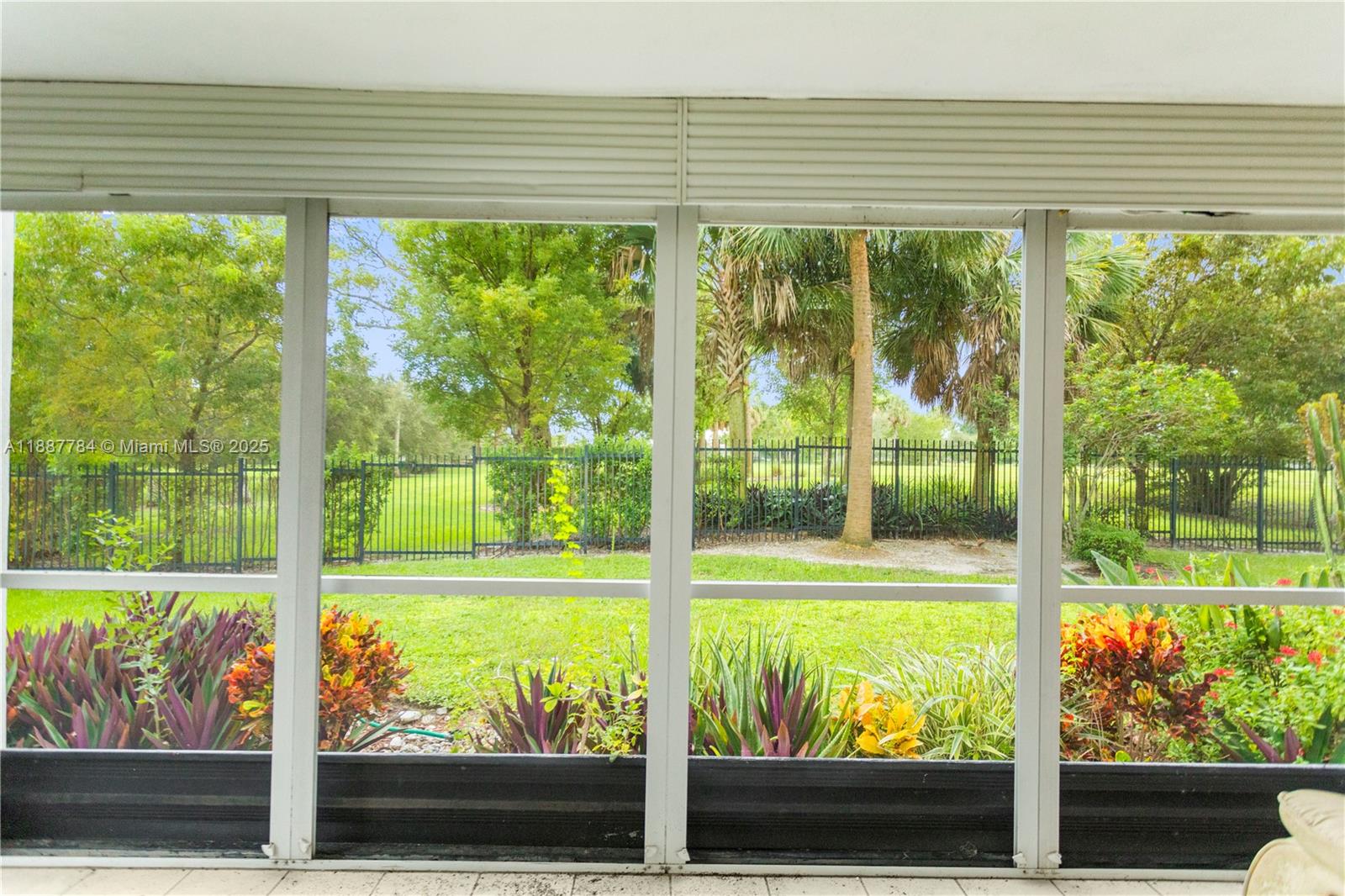4800 Hillcrest Lane, Unit 101 Hollywood, FL 33021 - Photo 4 of 35 a view of a room and a window