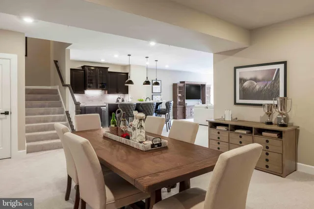 a spacious bedroom with a bed and wooden floor