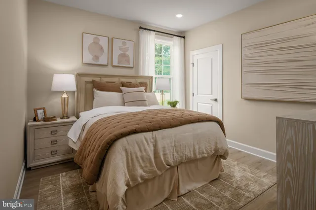 a bathroom with a sink a toilet a tub and shower