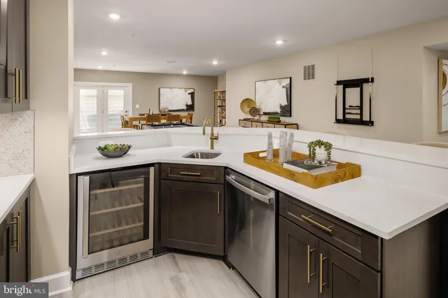 a bedroom with a bed and a night stand