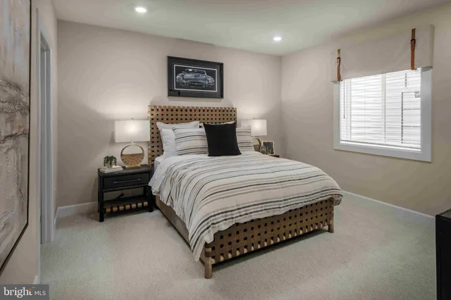 a view of a dining table and chairs on the roof deck
