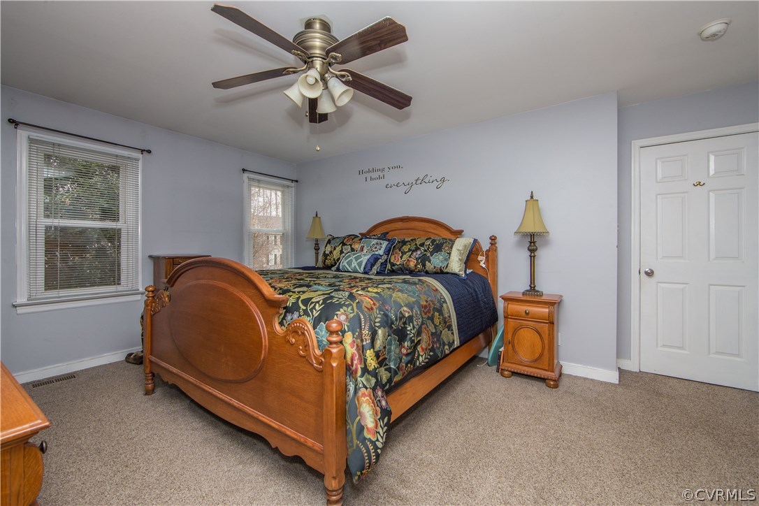 4907 Cedar Cliff Road Chester, VA 23831 - Photo 23 of 36 a bedroom with a bed and window