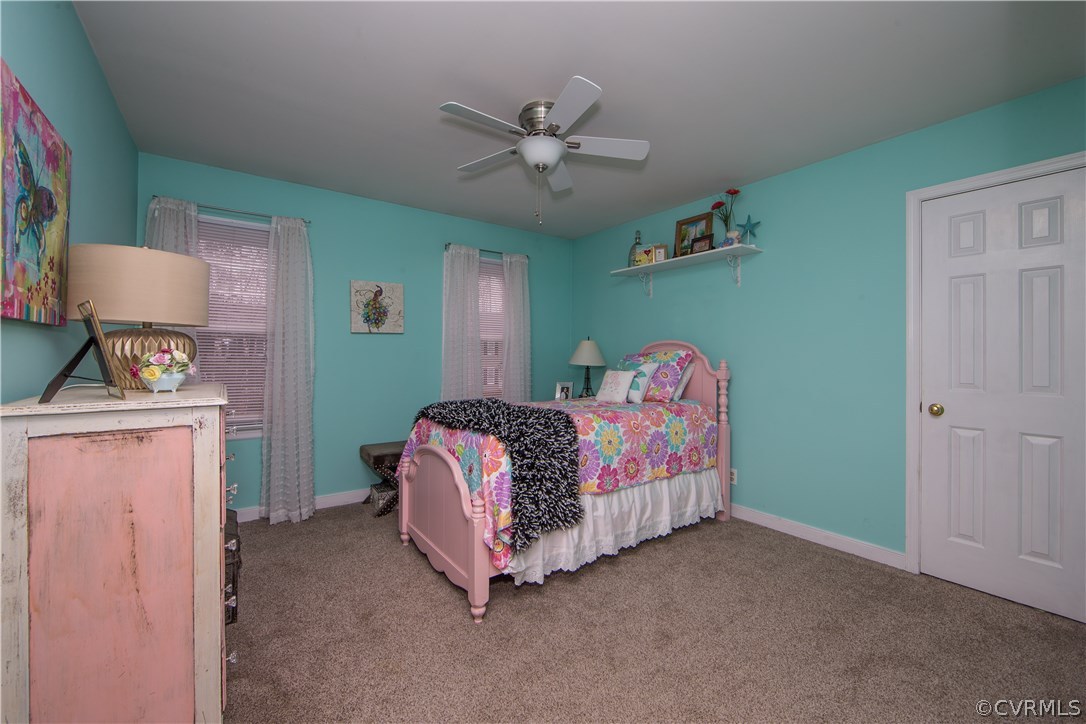 4907 Cedar Cliff Road Chester, VA 23831 - Photo 30 of 36 a bed room with a bed and a window