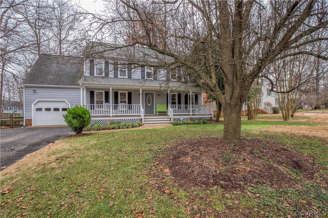 4907 Cedar Cliff Road Chester, VA 23831 - Photo 3 of 36 a front view of a house with garden