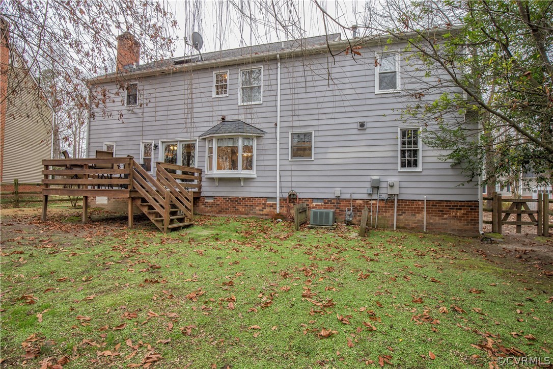 4907 Cedar Cliff Road Chester, VA 23831 - Photo 6 of 36 a backyard of a house with table and chairs