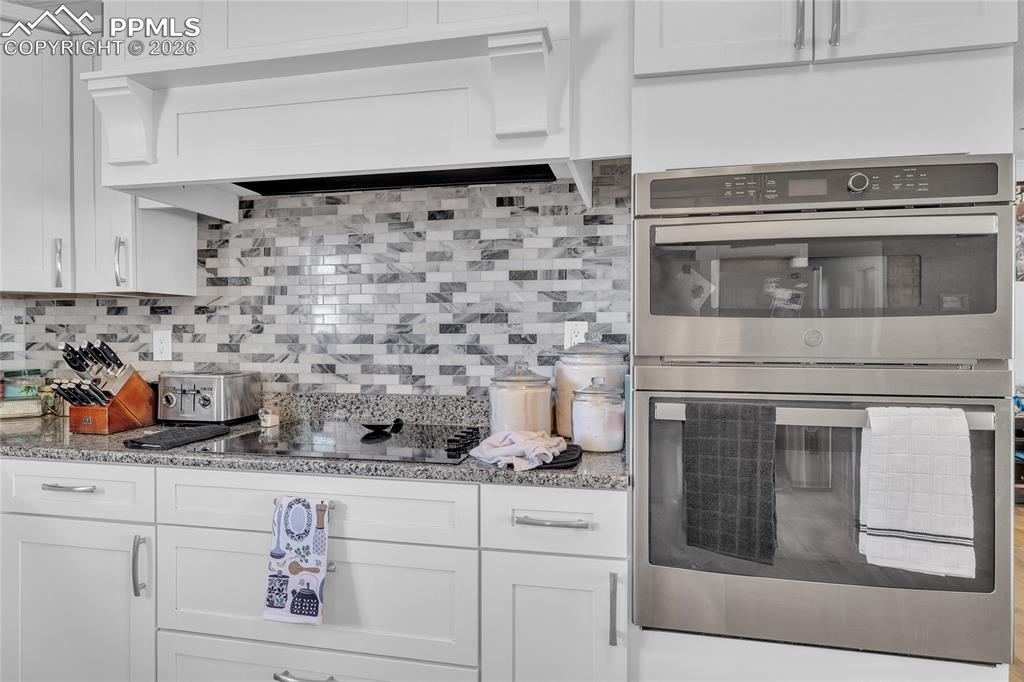 68300 Highway 50 Fowler, CO 81039 - Photo 28 of 47 Kitchen with double oven and white cabinets