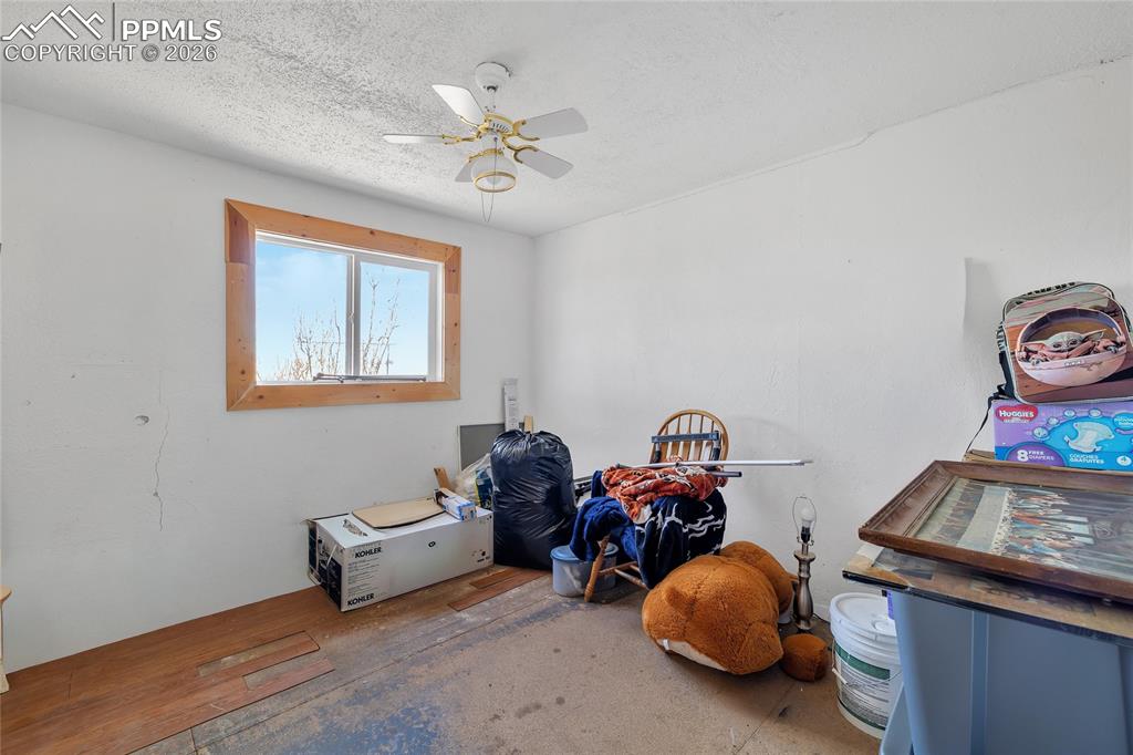68300 Highway 50 Fowler, CO 81039 - Photo 32 of 47 ADU Misc room featuring ceiling fan and a textured ceiling