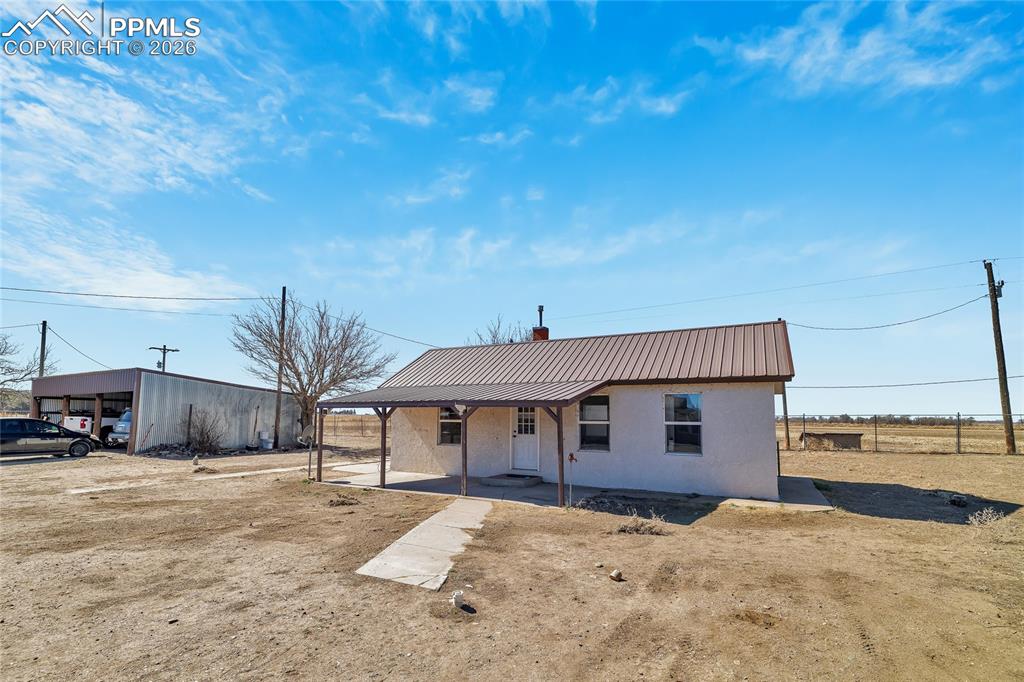 68300 Highway 50 Fowler, CO 81039 - Photo 41 of 47 ADU Unfurnished room with dark wood-style flooring and ceiling fan