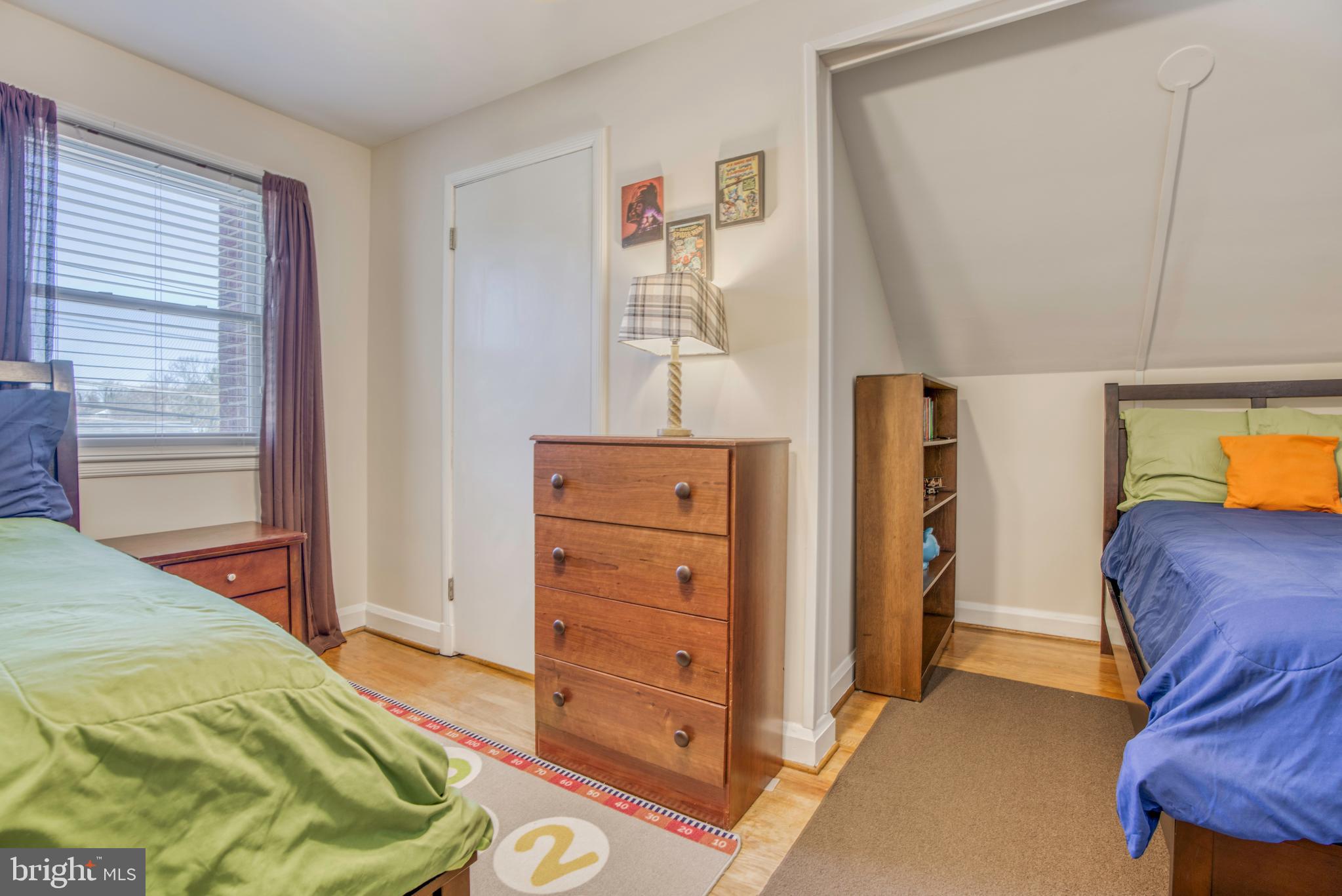 1305 Glendale Road Baltimore, MD 21239 - Photo 32 of 49 a bedroom with a bed and a mirror