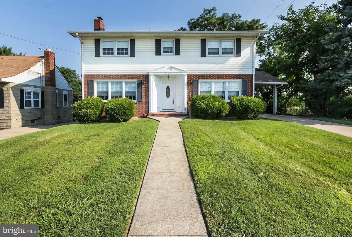 7722 Trappe Road Dundalk, MD 21222 - Photo 1 of 27 a front view of a house with yard