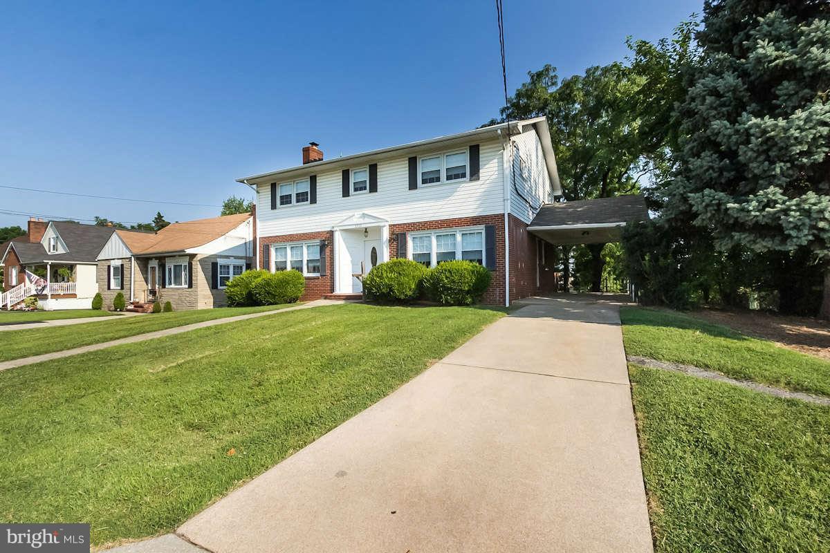 7722 Trappe Road Dundalk, MD 21222 - Photo 2 of 27 a front view of a house with a yard