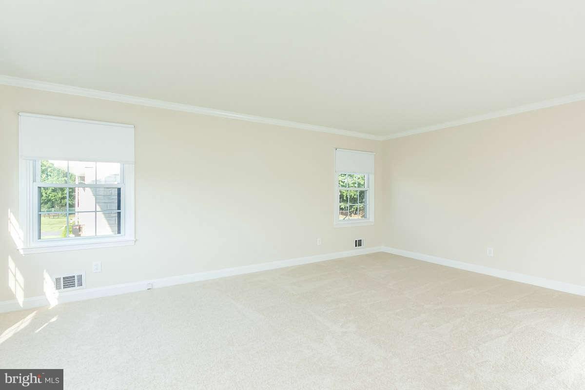 7722 Trappe Road Dundalk, MD 21222 - Photo 3 of 27 an empty room with a window
