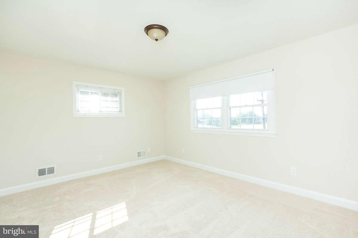7722 Trappe Road Dundalk, MD 21222 - Photo 23 of 27 an empty room with a window