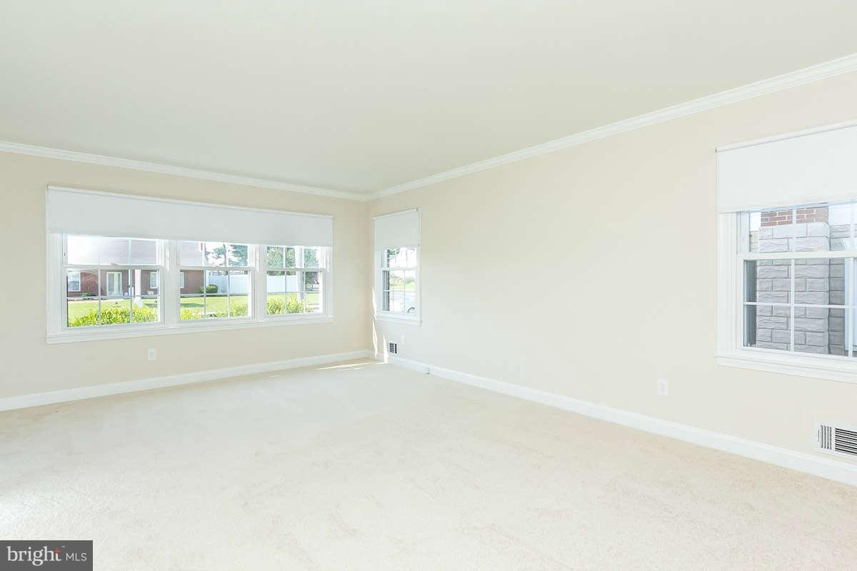 7722 Trappe Road Dundalk, MD 21222 - Photo 4 of 27 an empty room with windows