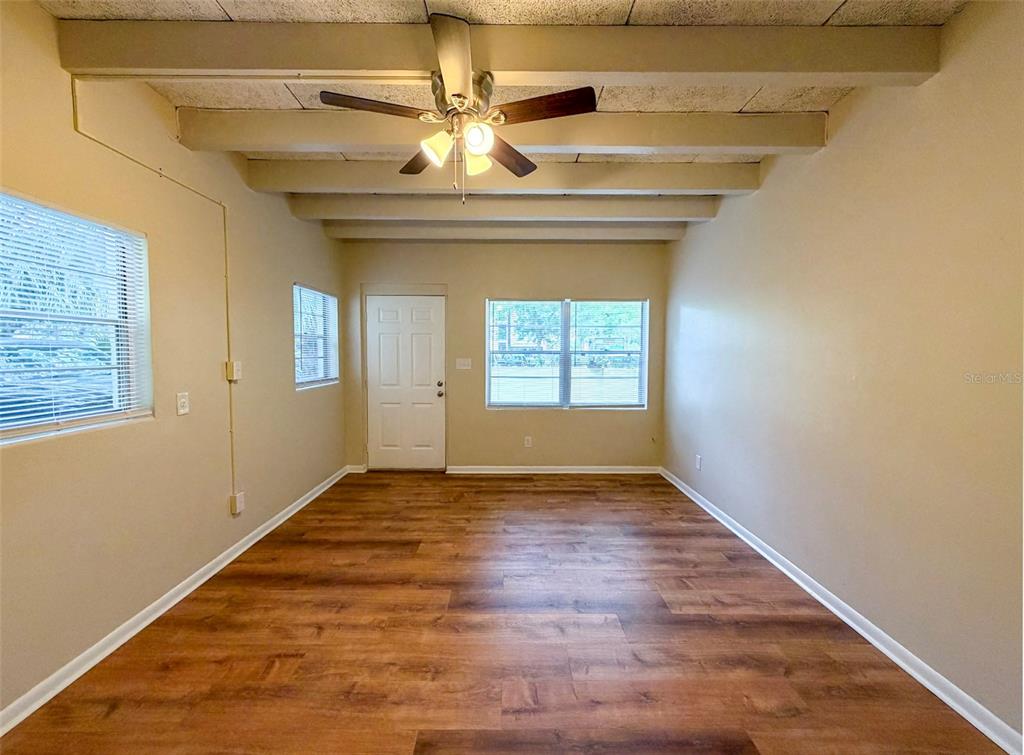 219 Northwest 3rd Avenue, Unit B Gainesville, FL 32601 - Photo 5 of 20 a view of an empty room with a window