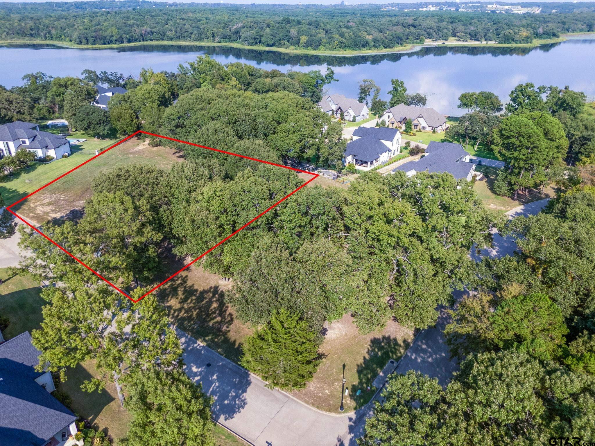 2473 Wellington Trace Tyler, TX 75709 - Photo 5 of 18 a view of a lake with a lake view