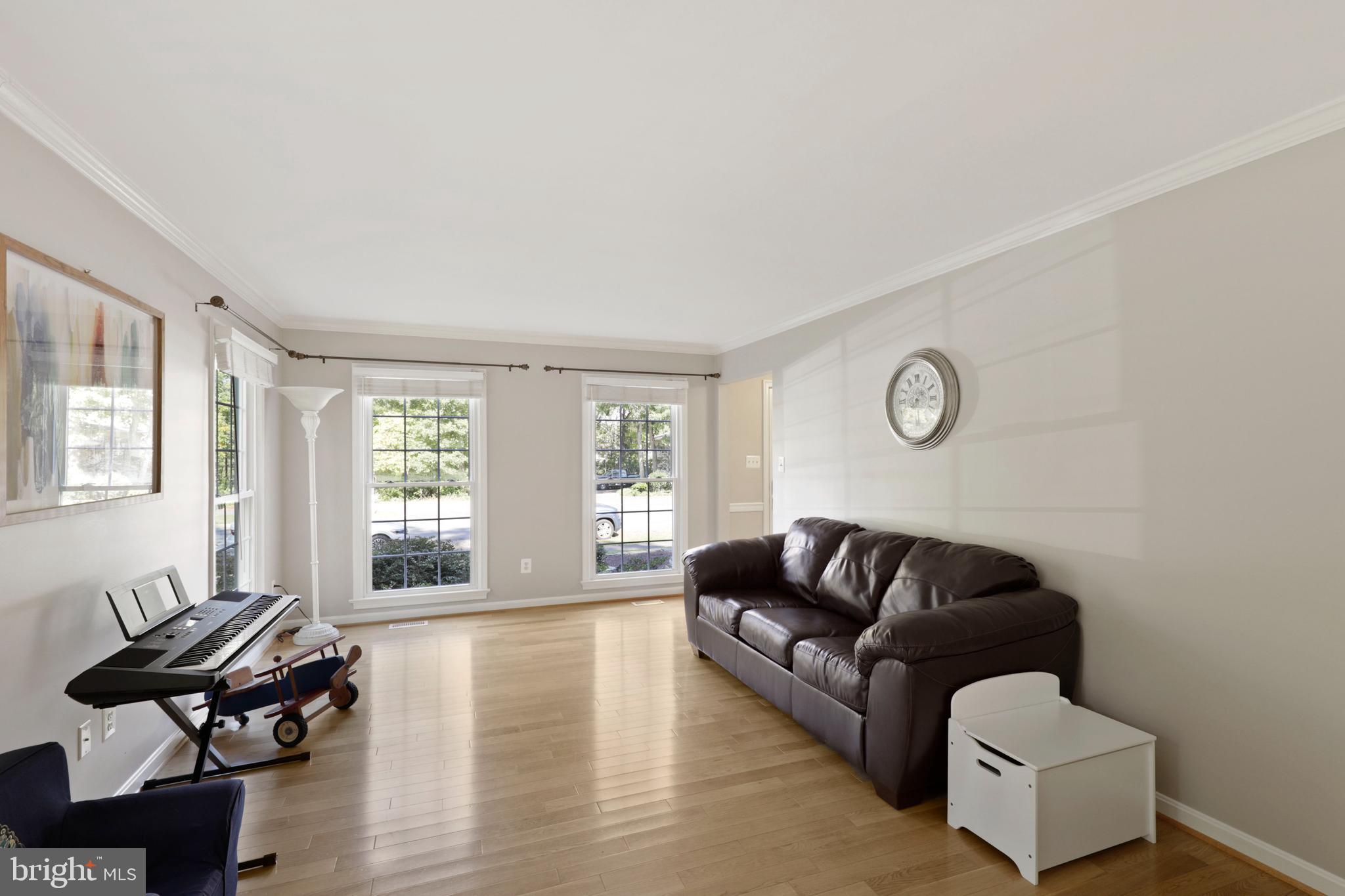 2 Carrollton Road Sterling, VA 20165 - Photo 12 of 40 formal living room with floor to ceiling windows