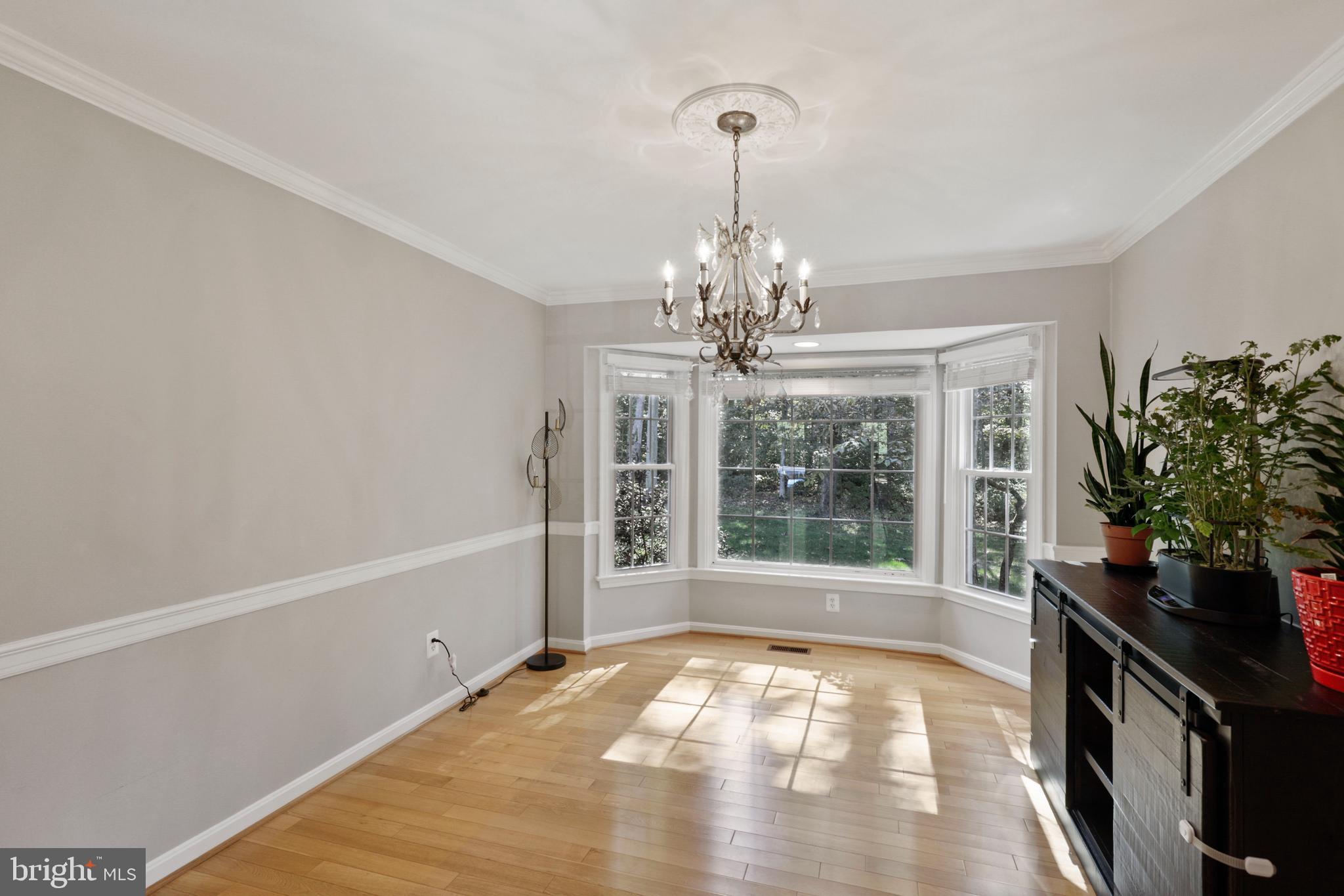 2 Carrollton Road Sterling, VA 20165 - Photo 13 of 40 formal dining room with oversized windows