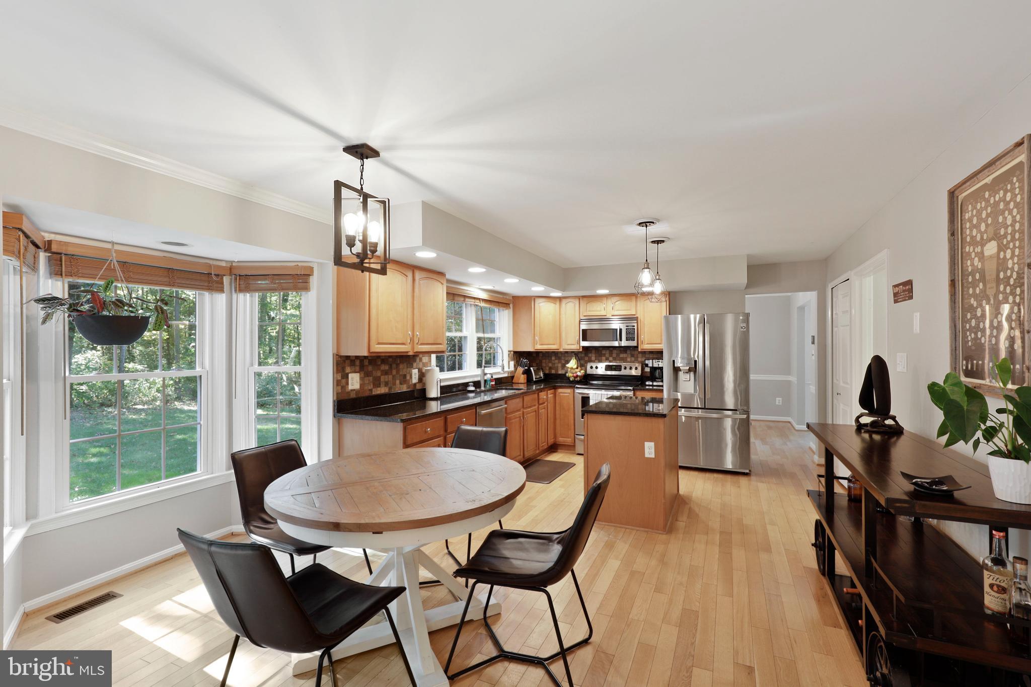 kitchen with breakfast nook and bay window