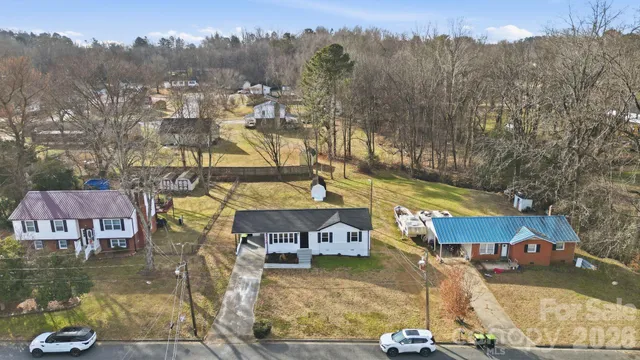 a view of a town with mountains in the background