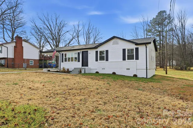 a house with trees in the background