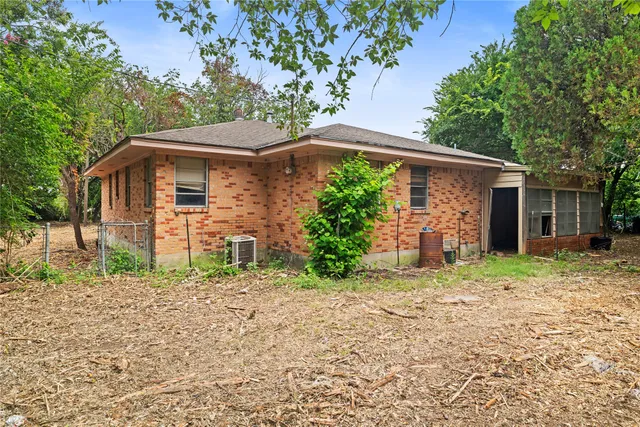 an aerial view of a yard with an outdoor seating