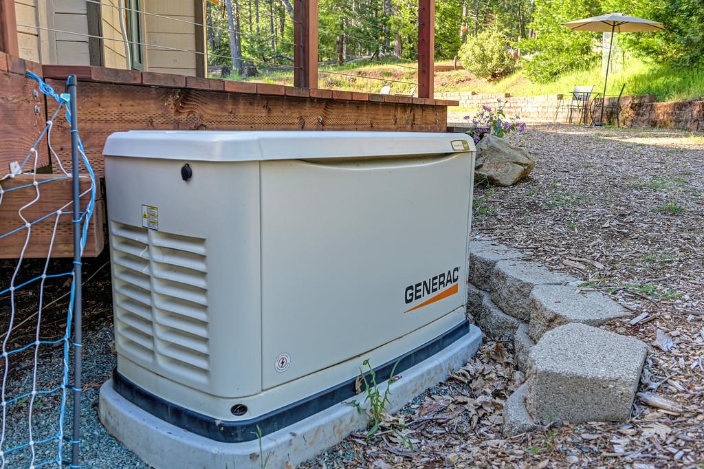 5415 Robert Road Pollock Pines, CA 95726 - Photo 53 of 72 Back up generator 2022. Can run 5 days 24/7.