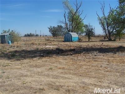 3526 Sankey Road Pleasant Grove, CA 95668 - Photo 1 of 1 a view of a yard with wooden fence