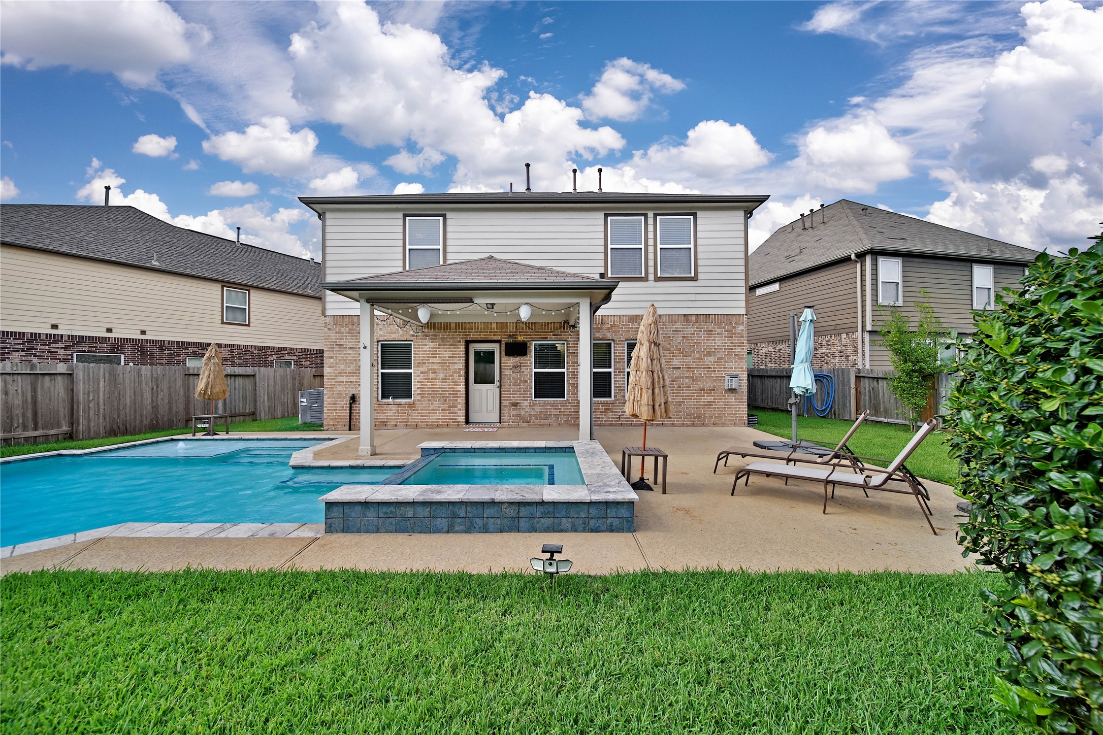 2672 Magnolia Fair Way Spring, TX 77386 - Photo 47 of 49 You'll love this stunning backyard with a sparkling pool and spa, no rear neighbors, and a gas line available.