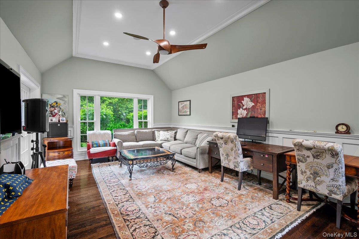 7 Harcourt Road Scarsdale, NY 10583 - Photo 15 of 34 a living room with furniture and a flat screen tv