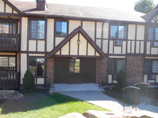 45 Canterbury Road, Unit 45 Bridgeport, CT 06606 - Photo 1 of 1 a house view with a outdoor space