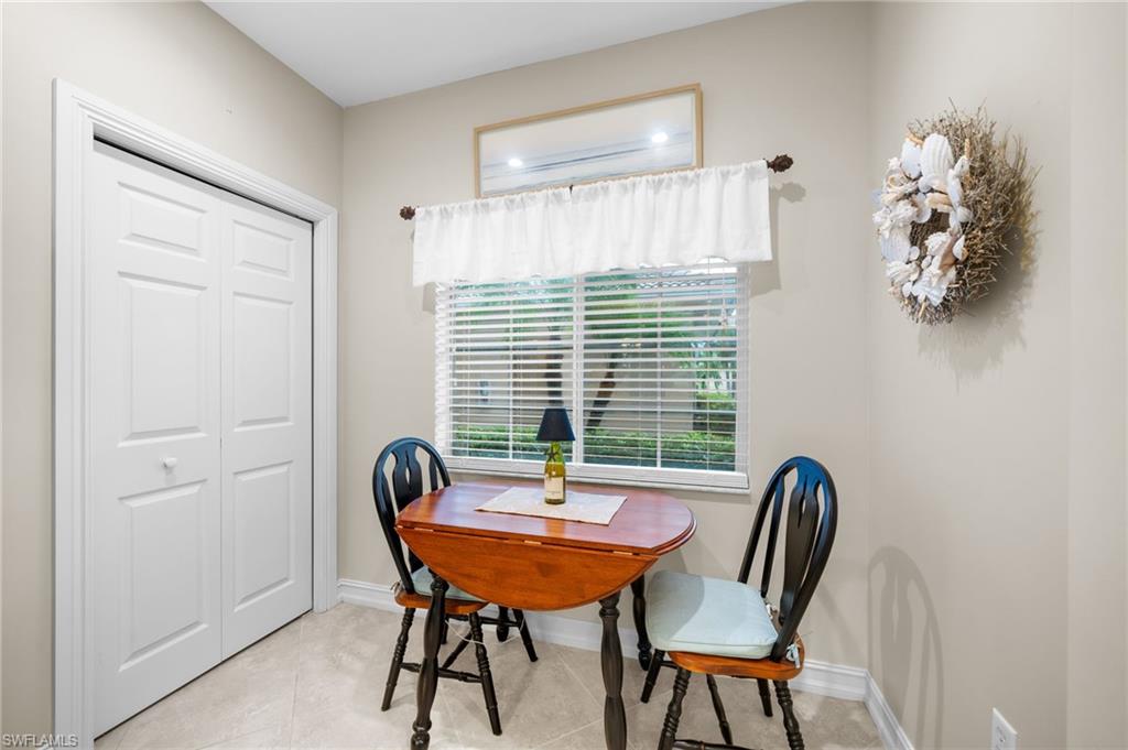 9128 Michael Circle, Unit 9 Naples, FL 34113 - Photo 22 of 50 Dining room featuring light tile floors