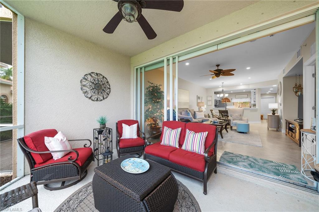 9128 Michael Circle, Unit 9 Naples, FL 34113 - Photo 25 of 50 View of patio featuring an outdoor living space and ceiling fan