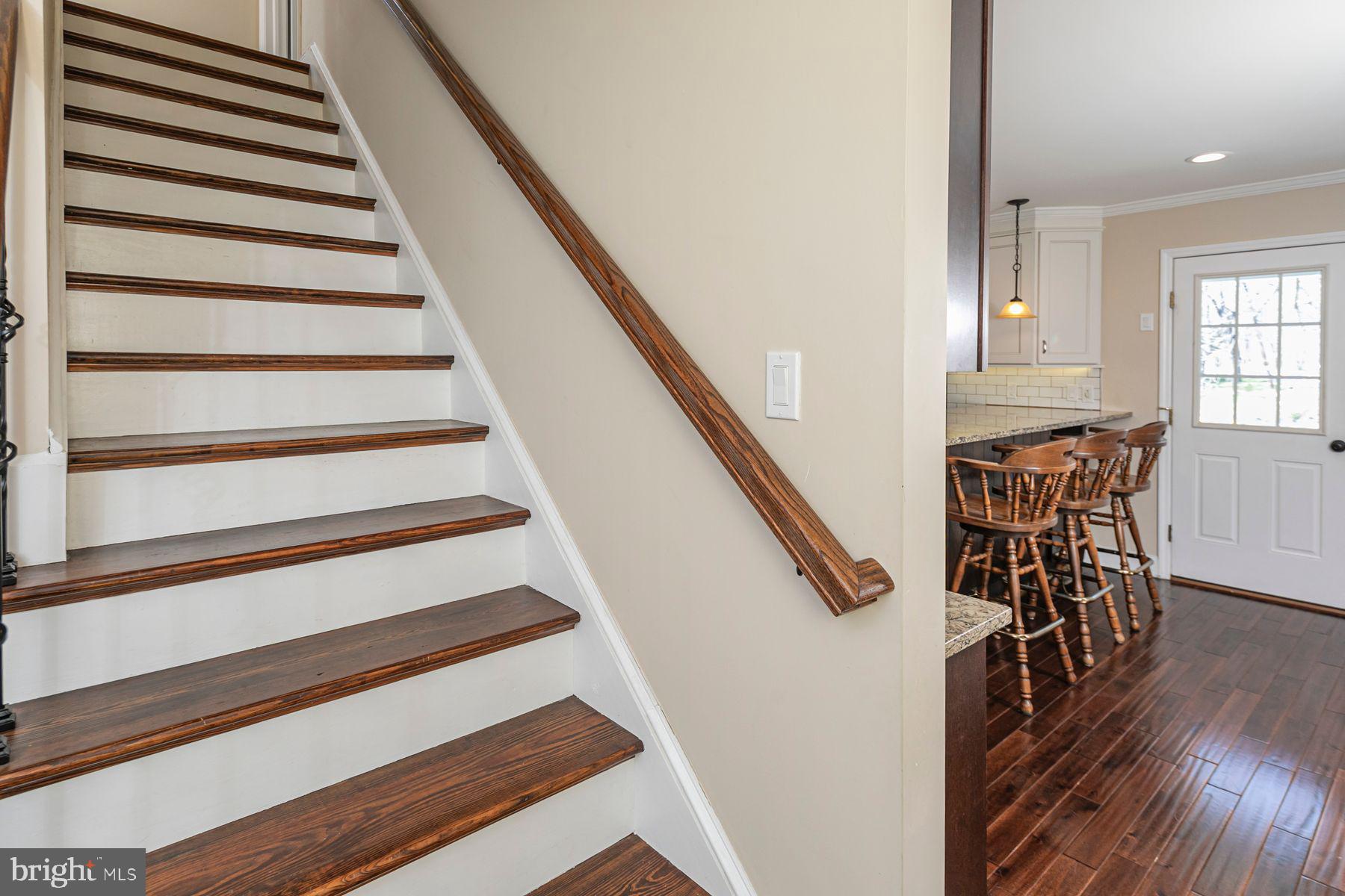 310 Hollow Road Skillman, NJ 08558 - Photo 17 of 32 a view of entryway and hall with wooden floor
