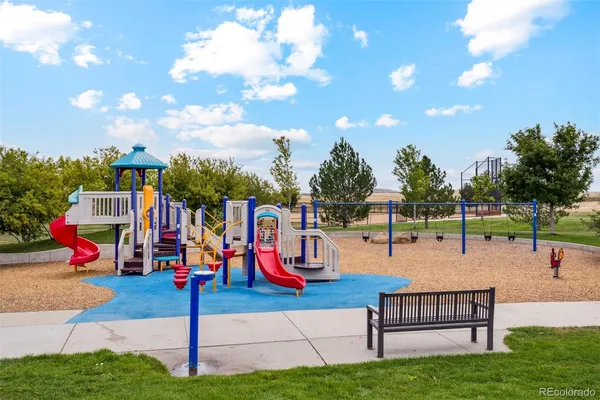 a view of a park with swings