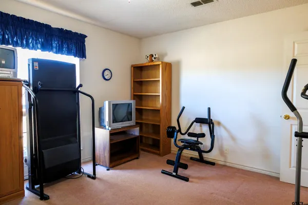 a view of a kitchen with workspace and a window