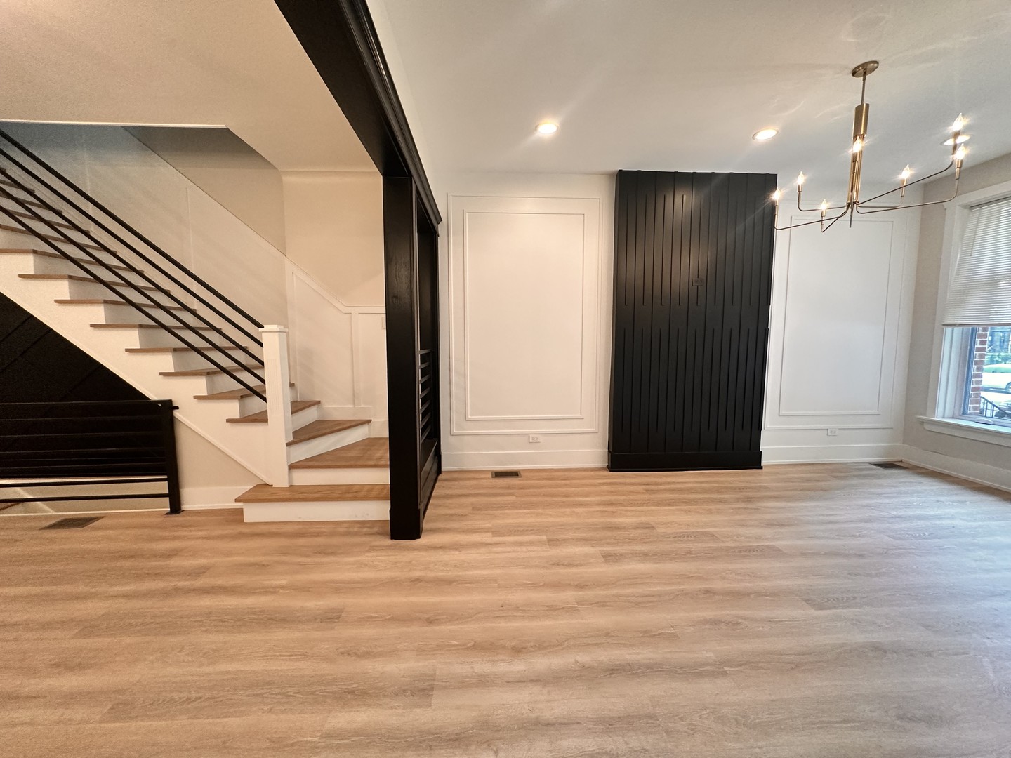 4409 South Prairie Avenue Chicago, IL 60653 - Photo 12 of 44 a view of an empty room with stairs and ventilation