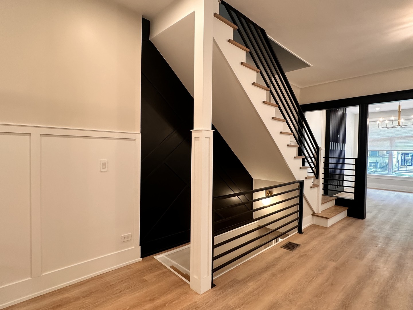 4409 South Prairie Avenue Chicago, IL 60653 - Photo 13 of 44 a view of an entryway with wooden floor and door