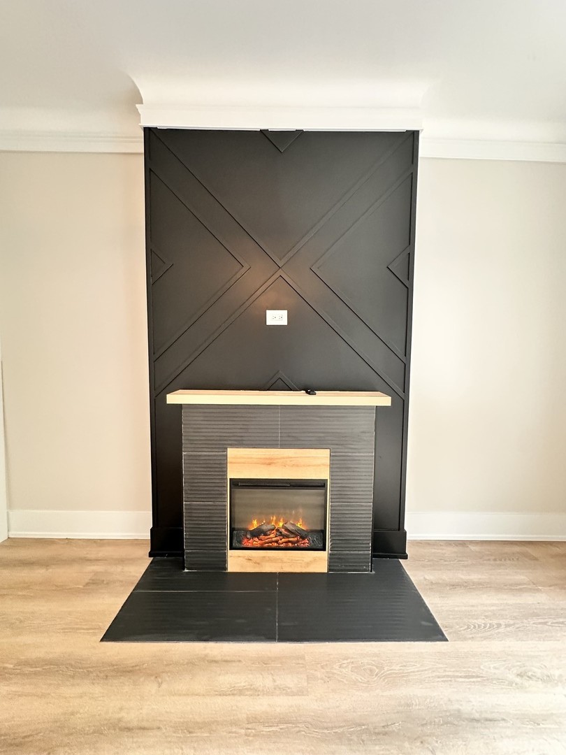 4409 South Prairie Avenue Chicago, IL 60653 - Photo 28 of 44 a view of a fireplace in a room