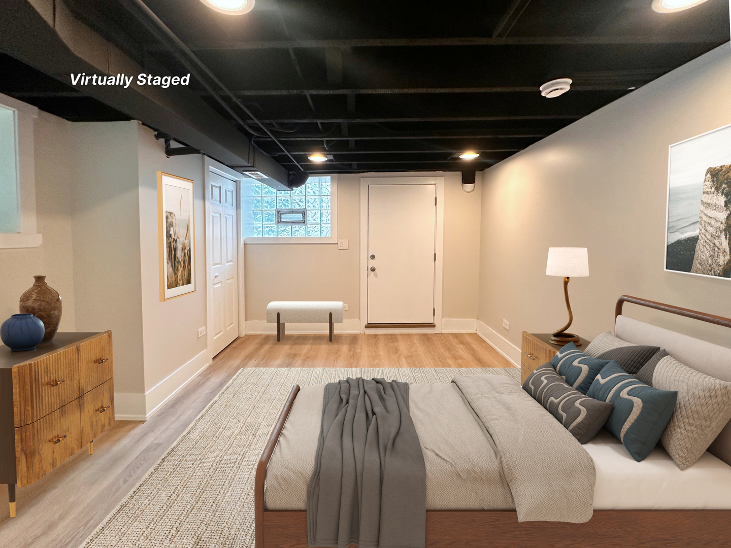 4409 South Prairie Avenue Chicago, IL 60653 - Photo 36 of 44 a bedroom with a bed and wooden floor